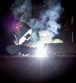 Welding fume and smoke during a machine process